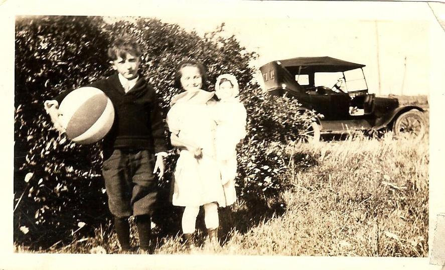 Ed and Niel
in front of the Roman Family’s Ford, 1920s
