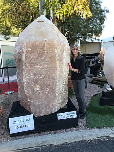 Margie next to a giant quartz crystal